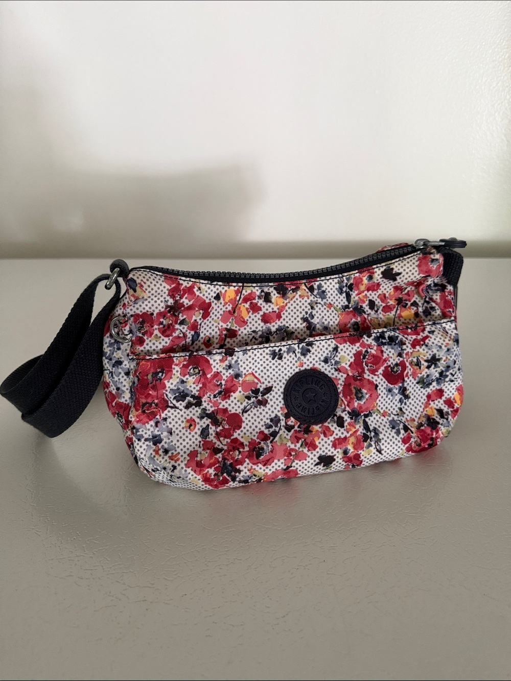 Kipling Floral Print shoulder Crossbody in  floral White, Red, Black print
